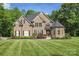 Charming brick home featuring manicured landscaping and an inviting front entrance at 3398 Millstone Creek Rd, Lancaster, SC 29720