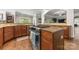 Spacious kitchen with granite countertops, wood cabinets, and stainless steel appliances at 3398 Millstone Creek Rd, Lancaster, SC 29720