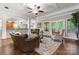 Spacious living room boasts hardwood floors, coffered ceiling, open layout perfect for entertaining, and natural light at 3398 Millstone Creek Rd, Lancaster, SC 29720