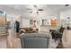 Open-concept living area featuring hardwood floors, an open layout, and seamless flow to the kitchen and entryway at 3398 Millstone Creek Rd, Lancaster, SC 29720