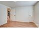 Bright bedroom features laminate flooring and two closet doors providing ample storage space at 405 Belva St, Kannapolis, NC 28081