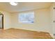 Dining area with large window, adjacent to the kitchen, with lots of natural light at 405 Belva St, Kannapolis, NC 28081