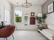 Charming bedroom featuring a comfortable sofa, stylish decor, and a bright window at 411 Old Town Village Rd, Waxhaw, NC 28173