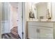 Well-lit bathroom with a vanity, modern fixtures, and neutral finishes at 4248 Black Ct # 232, Harrisburg, NC 28075