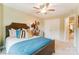 Comfortable bedroom with a ceiling fan, nice natural light, and a large double door closet at 4248 Black Ct # 232, Harrisburg, NC 28075