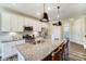 Spacious kitchen featuring an island with bar seating, stainless steel appliances, and ample counter space at 4248 Black Ct # 232, Harrisburg, NC 28075