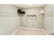Bright, empty walk-in closet with neutral carpet and wire shelving ready for customizable storage at 4248 Black Ct # 232, Harrisburg, NC 28075