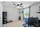 This bedroom offers a ceiling fan and a large window for lots of natural light at 4439 Wild Ridge Dr, Charlotte, NC 28215