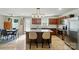 Well-equipped kitchen with center island, stainless appliances, and adjoining dining area at 4439 Wild Ridge Dr, Charlotte, NC 28215