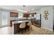 Stylish kitchen with granite countertops, stainless steel appliances, and a center island at 4439 Wild Ridge Dr, Charlotte, NC 28215