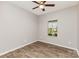 Bedroom with a ceiling fan and natural light from a window at 5053 Arbordale Way, Mount Holly, NC 28120