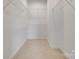 Walk-in closet with carpeted floor and wire shelving providing ample storage space for organization at 5705 White St, Fort Lawn, SC 29714