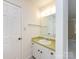 Traditional bathroom with a sink, vanity, and well-lit mirror at 6007 Patrick Pl, Charlotte, NC 28210