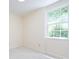 Bright bedroom featuring a large window allowing for ample natural light at 6007 Patrick Pl, Charlotte, NC 28210