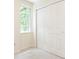 Bedroom featuring a window and a closet with sliding doors at 6007 Patrick Pl, Charlotte, NC 28210