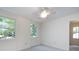 Bright bedroom with multiple windows bringing in plenty of natural light at 6007 Patrick Pl, Charlotte, NC 28210