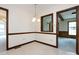 Charming dining room with wood trim and views to other rooms at 6007 Patrick Pl, Charlotte, NC 28210