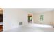 Spacious living room with plush carpeting, neutral paint, and natural light at 6007 Patrick Pl, Charlotte, NC 28210