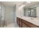 Dual vanity bathroom featuring a glass door shower and granite countertop at 7209 Brookline Pl, Huntersville, NC 28078
