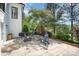 Outdoor space featuring a cozy stone fire pit with Adirondack seating at 7280 Woodside Ct, Denver, NC 28037