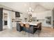 Spacious kitchen featuring a marble island with seating and modern appliances at 7280 Woodside Ct, Denver, NC 28037