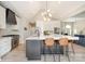Modern kitchen boasting a large center island, stainless steel appliances, and adjacent seating at 7280 Woodside Ct, Denver, NC 28037