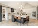 Spacious kitchen featuring a marble island with seating and modern appliances at 7280 Woodside Ct, Denver, NC 28037
