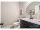 Tastefully decorated powder room featuring a modern sink and fixtures at 7280 Woodside Ct, Denver, NC 28037