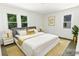 Bedroom features hardwood floors, neutral walls, and lots of natural light at 751 N Miller Ave, Statesville, NC 28677
