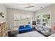 Bright room with a hanging chair, chalkboard and comfortable seating area with natural light at 10201 Daufuskie Dr, Charlotte, NC 28278