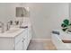 Bathroom showcasing a sink, mirror, vanity, and bathtub at 10508 Madison Park Dr, Charlotte, NC 28269