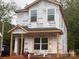 New construction home featuring a covered front porch and large windows at 115 Allen St, Rock Hill, SC 29730