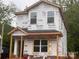 New construction home featuring a covered front porch and large windows at 115 Allen St, Rock Hill, SC 29730