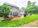 Spacious backyard patio featuring dining and seating areas, perfect for outdoor entertaining at 1151 Gower St, Fort Mill, SC 29708