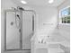 Bathroom featuring a soaking tub and glass shower offers a relaxing retreat with clean, bright design at 1151 Gower St, Fort Mill, SC 29708