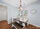 Charming dining area with bench seating, modern lighting, and lots of natural light at 1151 Gower St, Fort Mill, SC 29708