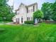 Charming two-story home with well-manicured lawn and attractive landscaping at 1151 Gower St, Fort Mill, SC 29708