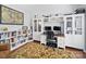 Well-organized home office featuring built-in bookshelves, desk, and ample storage space at 1151 Gower St, Fort Mill, SC 29708
