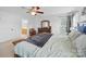 Comfortable main bedroom featuring a ceiling fan, large windows, and neutral decor at 1151 Gower St, Fort Mill, SC 29708