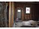 Unfinished interior with exposed framing, electrical, and doorway at 120 Mccleave Rd, China Grove, NC 28023