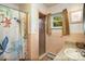 Bathroom featuring granite counters, shower, and floral shower curtain at 1239 Christopher Cir, Rock Hill, SC 29730