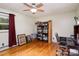 Bright bedroom showcasing hardwood floors, a ceiling fan, and ample natural light at 1239 Christopher Cir, Rock Hill, SC 29730