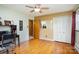 Comfortable bedroom with hardwood floors, ceiling fan, and closet space at 1239 Christopher Cir, Rock Hill, SC 29730