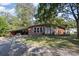 All brick home offering a covered parking area and a traditional, welcoming facade at 1239 Christopher Cir, Rock Hill, SC 29730