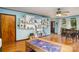 Spacious living area featuring hardwood floors, built-in shelving, and a doorway at 1239 Christopher Cir, Rock Hill, SC 29730