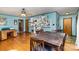Bright and airy living area with well-maintained hardwood flooring and ample shelving at 1239 Christopher Cir, Rock Hill, SC 29730