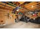 Spacious garage with visible wood beams and an abundance of storage and work space at 13624 Jacks Ln, Pineville, NC 28134