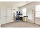 Bright office featuring dual monitors and modern decor at 13624 Jacks Ln, Pineville, NC 28134