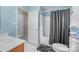 Practical bathroom with a shower-tub combination and a wood vanity at 1401 Thompson Ave, Charlotte, NC 28216