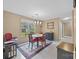Eat-in kitchen featuring a chandelier over the dining set and natural light at 1401 Thompson Ave, Charlotte, NC 28216